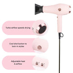 L'Ange Hair Soleil blow dryer showing the three heat and two airflow switches on the handle