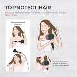 Ergonomic Tymo hair dryer held in hand for size reference