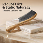 Onedor wooden comb showing unique natural wood grain pattern
