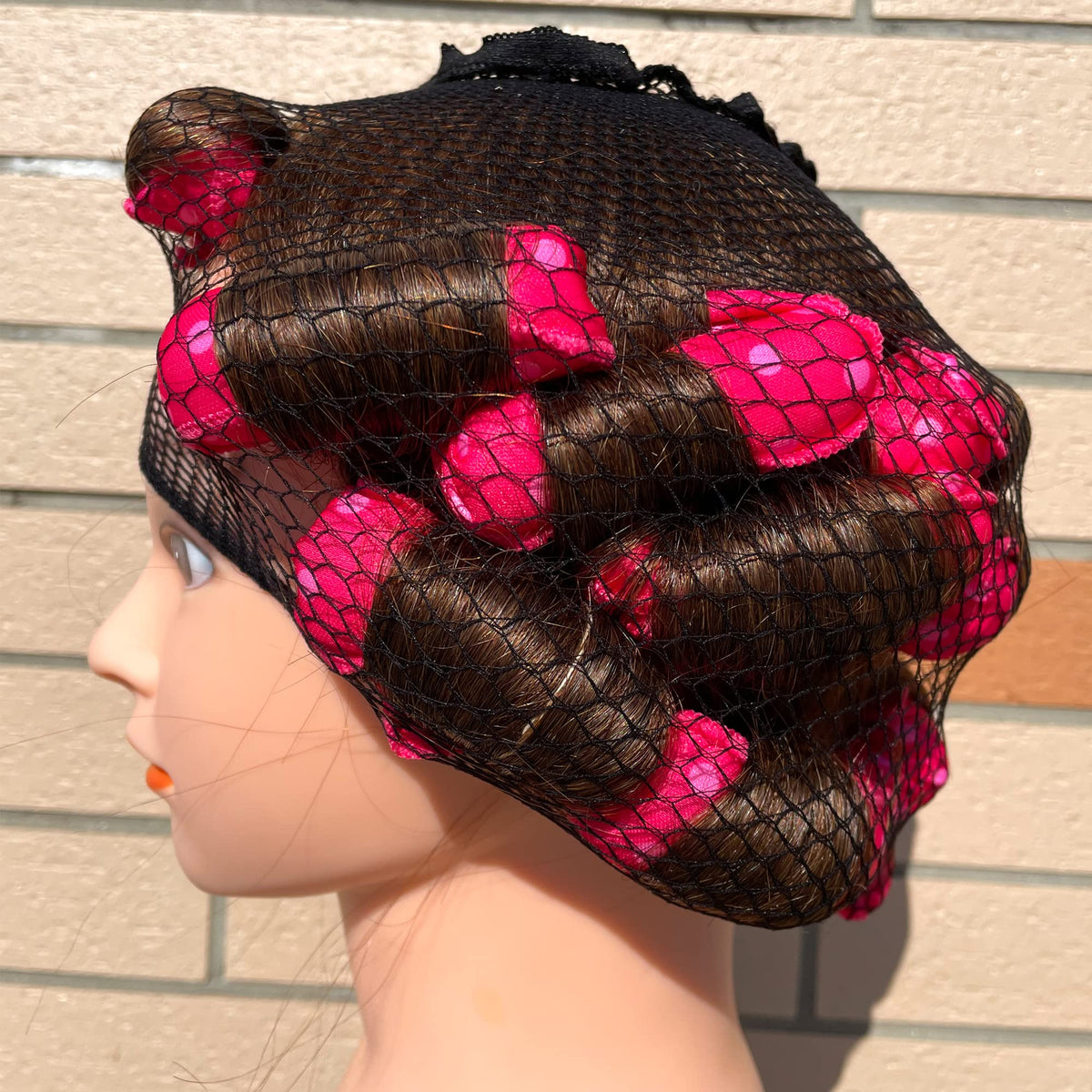 Side angle view of the lightweight Aimin hair rollers ideal for safe children hair styling.