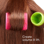 Different sizes of Conair self grip hair curlers displayed together