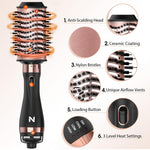 Natrial hot air volumizer close up highlighting the mixed nylon pins and braided bristles