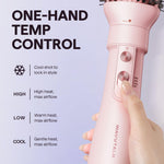 Close up view of the convenient one handed temperature control knob on the pink Wavytalk styler.