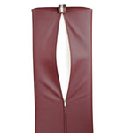 Massage therapist using 9 inch burgundy bolster on table