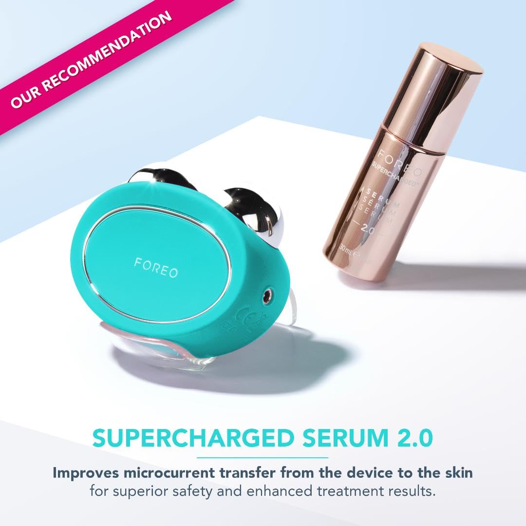 Person using Foreo Bear device on jawline for facial toning