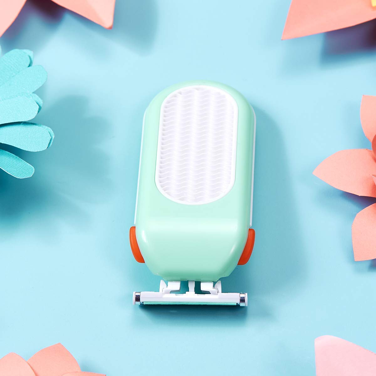 Domon Dolly womens shaver being rinsed under water to demonstrate anti clogging feature