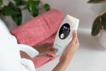 Side profile of the 5minskin 2.0 IPL machine highlighting the ergonomic power and flash buttons.