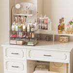 Three tier clear acrylic cosmetic storage drawers stacked vertically showing smooth slide rail functionality