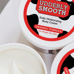 Udderly Smooth moisturizer bundle displaying the original water based formula ingredients list and manufacturing details