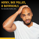 Bee Bald razor bump treatment tube angled view emphasizing the paraben free formulation.