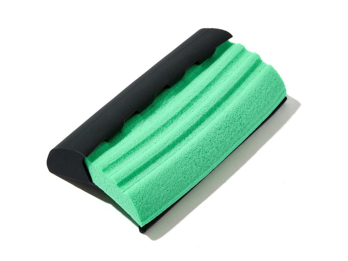 Close up of flexible green foam head on Mat's Beard Bar
