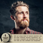 Man applying Striking Viking beard butter for grooming