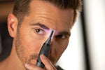 Micro Touch Titanium Max trimmer showing LED light feature