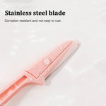 Miss Bella facial razor being held at an angle illustrating the textured non slip grip.