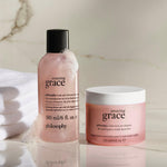Close up of the Philosophy whipped body crème open jar revealing the thick white moisturizer texture