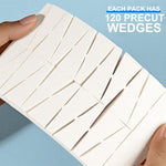 White sponge wedges being used for detailed under eye concealer application