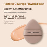 Oversized Rubycell foam beauty blender with finger strap for precise liquid foundation application