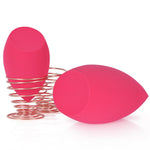 OtNiap giant foundation and fake tan application sponge demonstrating wet expansion size.