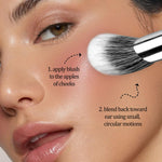 Side profile of the angled makeup brush illustrating the sloped cutting edge for cheekbone precision.