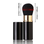 Portable face loose powder brush with protective cap removed showing natural goat hairs