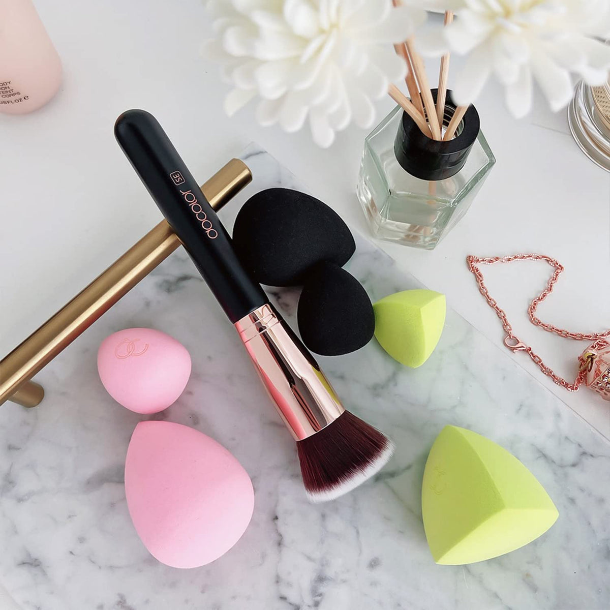 Close up view of the premium rose gold ferrule and cruelty free synthetic bristles.