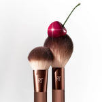 Real Techniques Cherry On Top pink handle dual sided beauty brush profile view