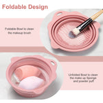 Collapsible pink cosmetic cleaning mat expanded into a washing basin