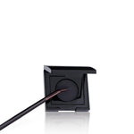 Close up of the narrow flat tip on the Laura Mercier eye liner makeup tool