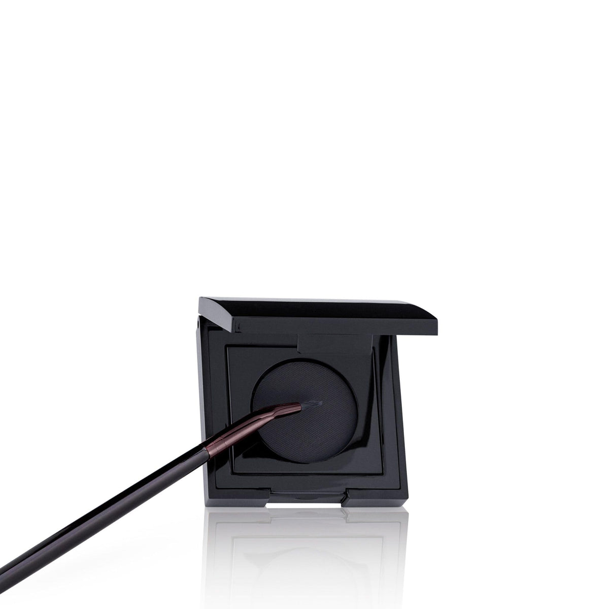 Close up of the narrow flat tip on the Laura Mercier eye liner makeup tool