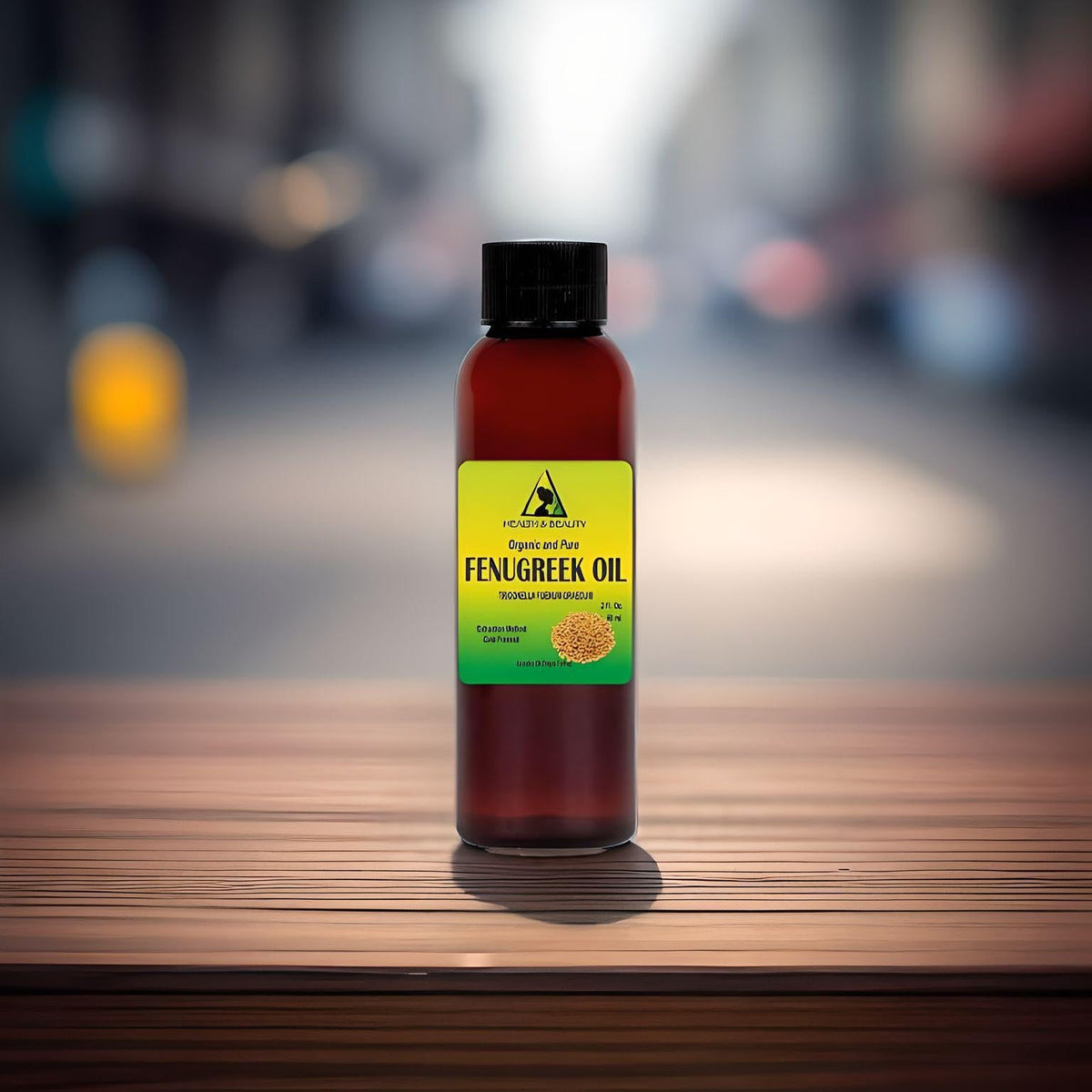 Amber glass bottle of organic fenugreek carrier oil for skin care