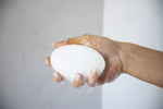 Spongeables dual sided body scrubber generating rich creamy lather under water