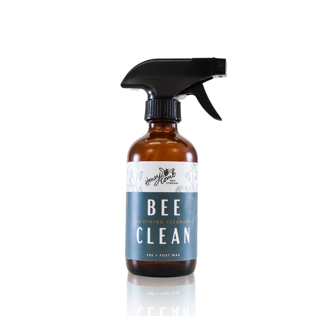 Honeycomb Wax Co BeeClean pre-wax spray bottle label closeup displaying premium natural ingredients list.