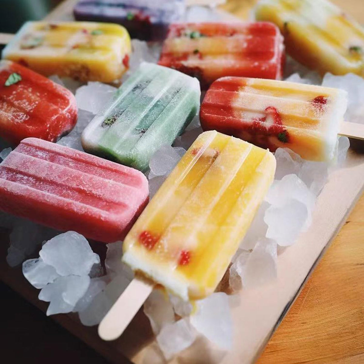 Side angle view of chemical free biodegradable birch wood ice cream sticks showing durability and clean construction.
