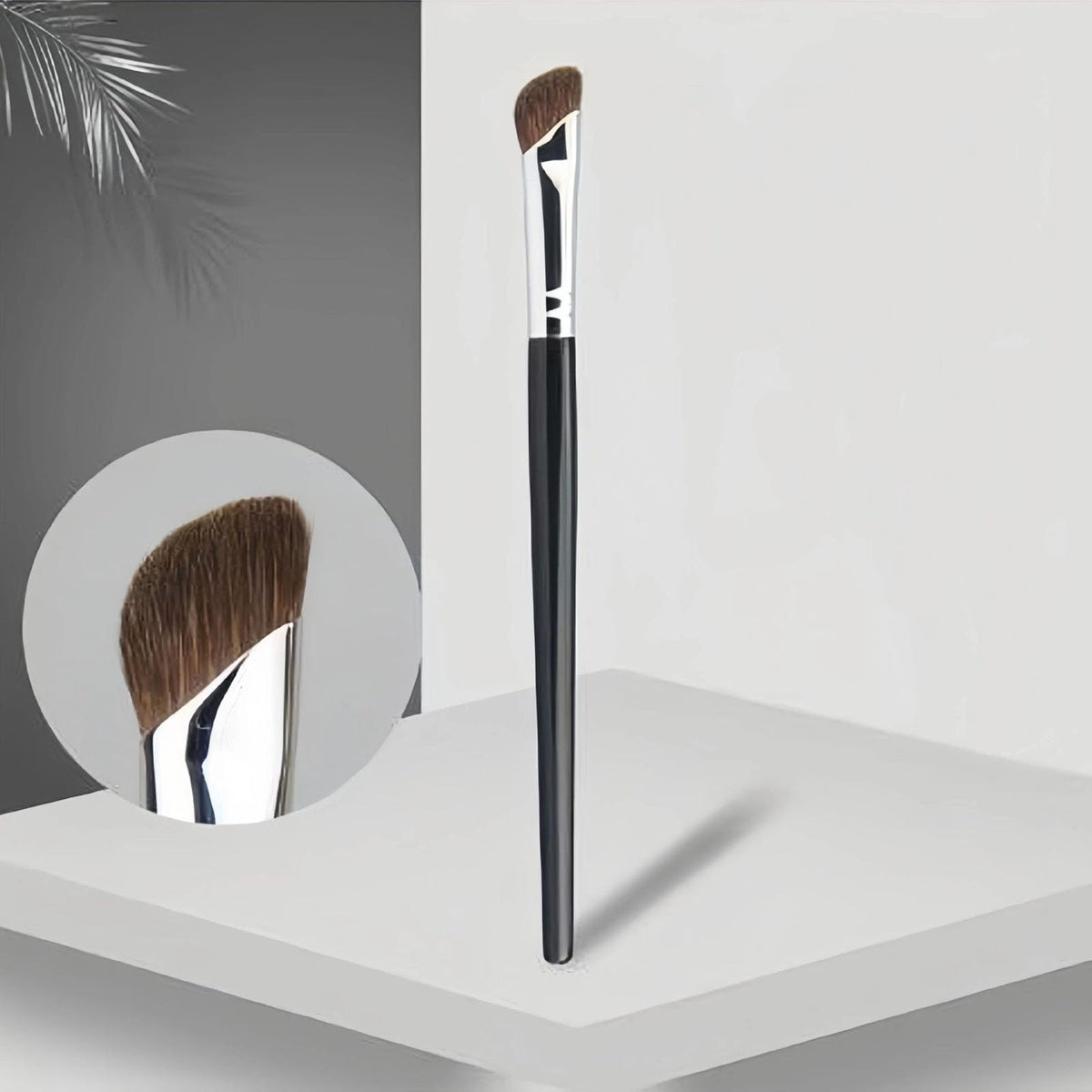 Using the half fan shape concealer brush under the eye area for detailed blending