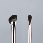 Detailed view of the wooden handle on the TEONEI professional nose contouring tool