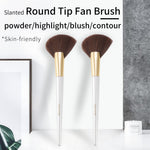 Close up of the 169L white contouring brush head showing the slanted fan shape profile