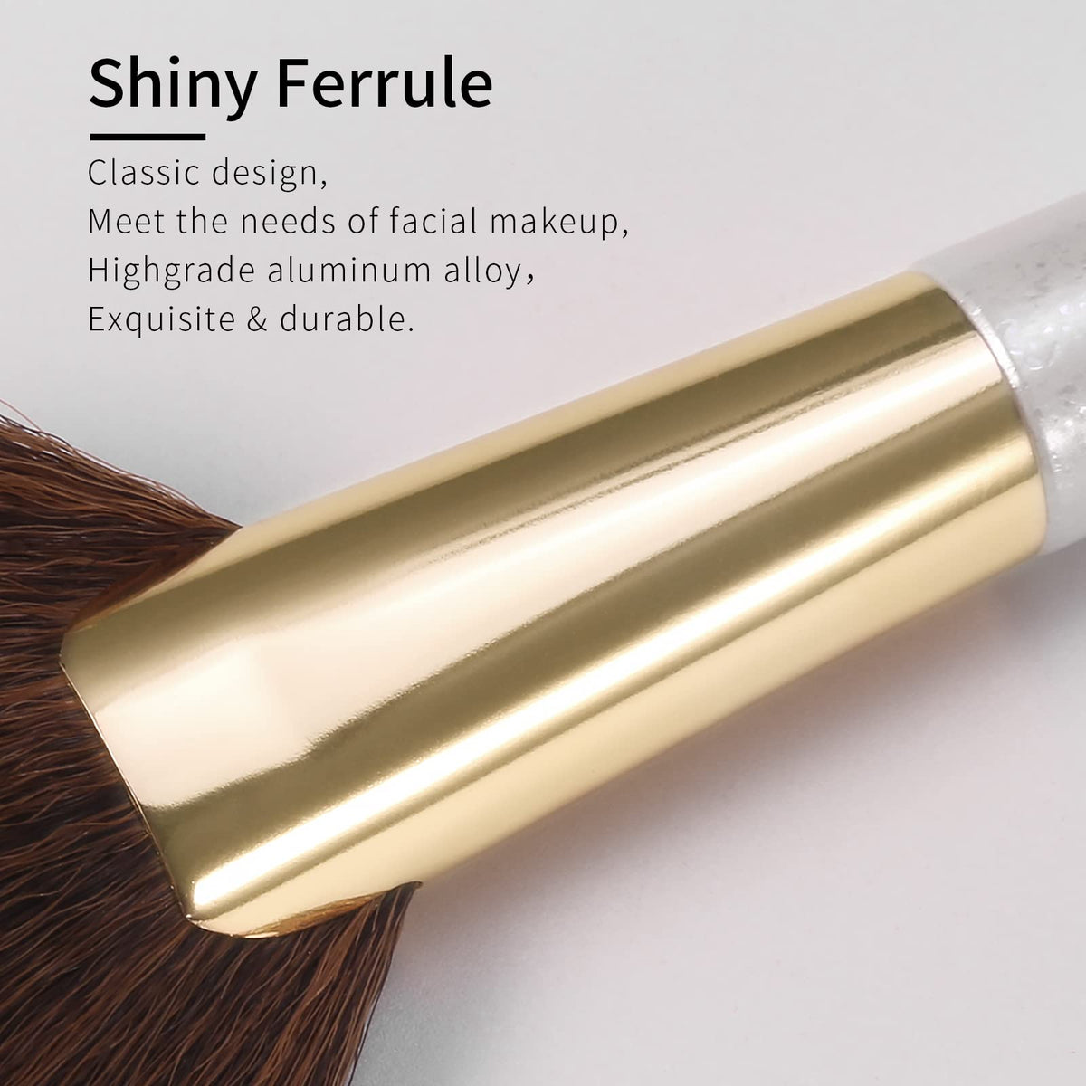 Angled fan brush being used to apply powder contour on the hollows of cheekbones
