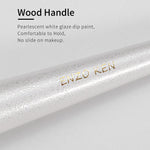 Side view of the thick fluffy highlighting brush showing resilience and flexible fiber design