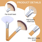 Salbsever short handle fan brush being used to apply a smooth facial mask on skin
