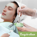 Abeillo 4 piece fan brushes set being rinsed under water for easy cleanup and maintenance.