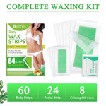Hypoallergenic body wax strips being separated before application on sensitive skin.