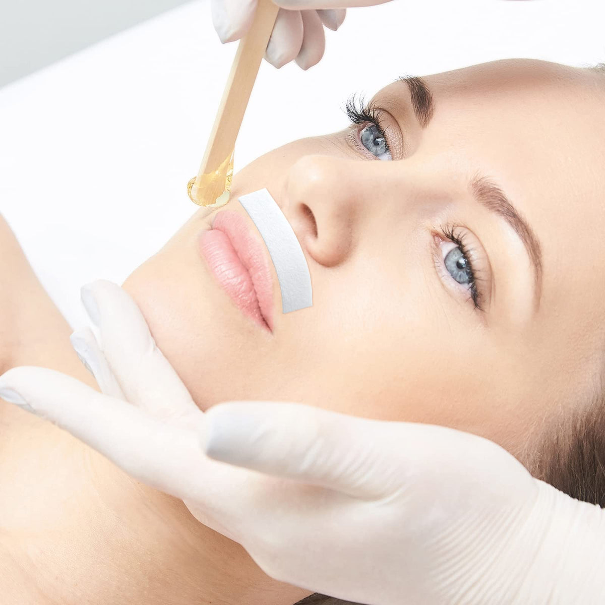 Smooth hair removal process showing durable texture of the fabric strip