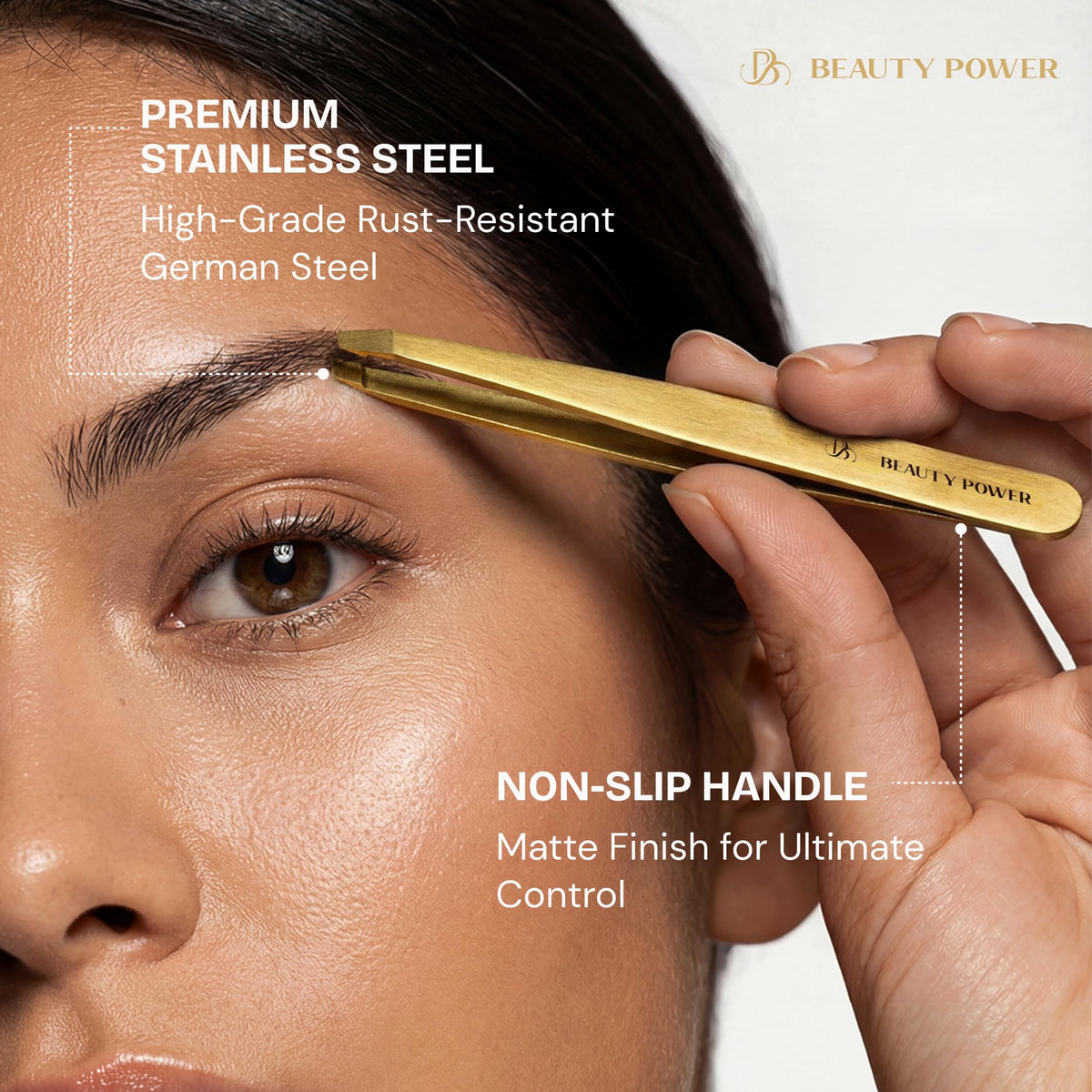 Matte gold facial hair plucker for women and men on plain backdrop