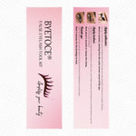 Portable lash extension brush combing through individual cluster lashes for a seamless look.