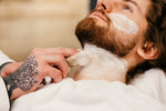 Rich creamy lather of C.O. Bigelow shaving cream for sensitive skin protection.
