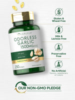 Quick release garlic extract capsules displayed next to the imported Carlyle bottle