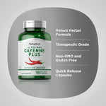 Close-up view of Piping Rock cayenne pepper capsules with ginger and hawthorn berry highlights on the label