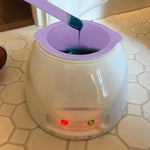 Close up view of the anti scalding handle on the KVZVK purple silicone wax bowl replacement