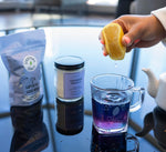 Steepers Only Slumber Party relaxation tea packaging showcased next to loose dried chamomile and lavender flowers