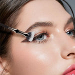 Professional makeup application using BusyLive lash fan brush